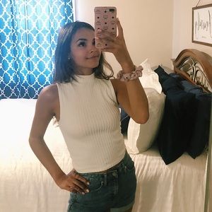 White sleeveless mock neck top